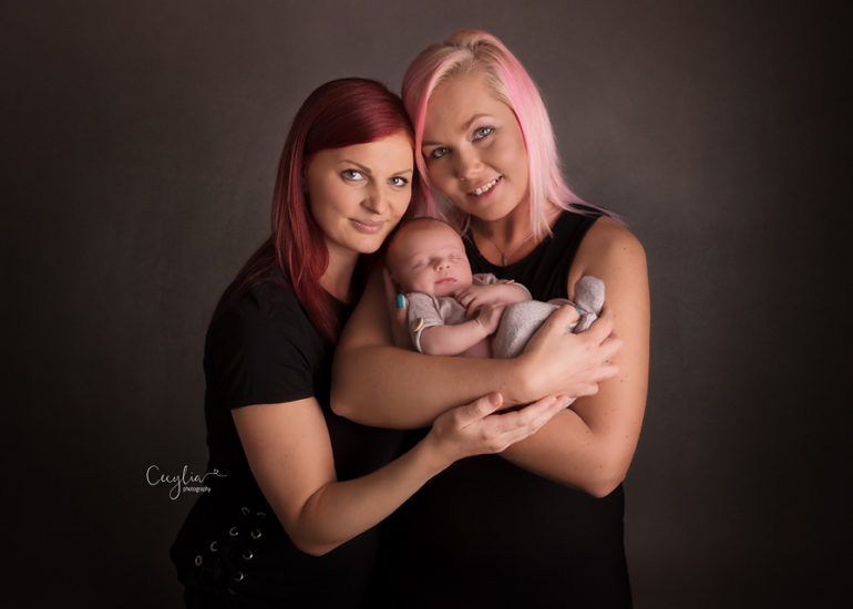 a newborn baby in mother hands