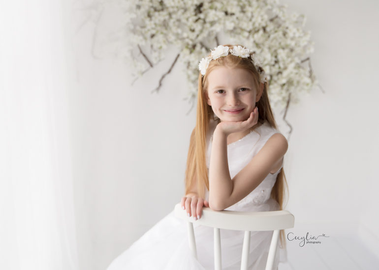 a girl at her first holy communion by cecylia photography
