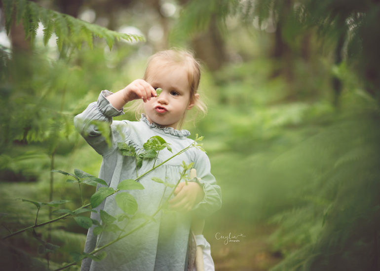 a small child having a fun in the park on cecylia photography session