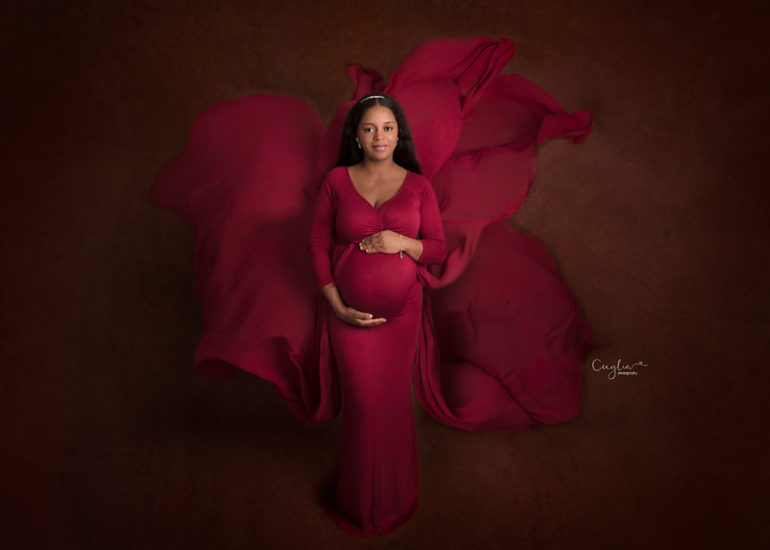 a pregnant women in red dress