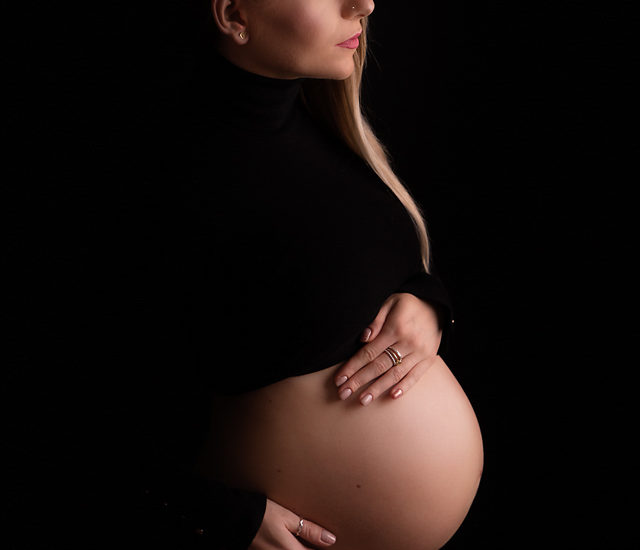 women in black maternity picture